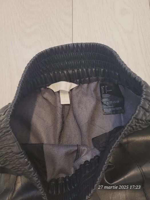 Pantaloni piele noi