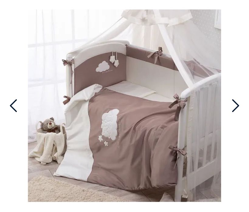 Продам детскую кроватку с маятником и комплектом в кроватку