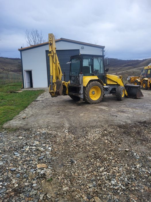 Vand buldoexcavator mf 750