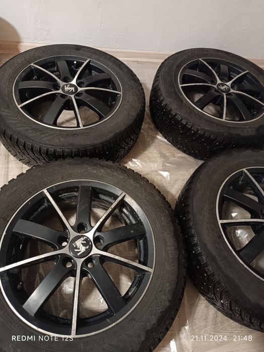 Колеса на титановых дисках, шипованные, 185/65/R15. Nordman