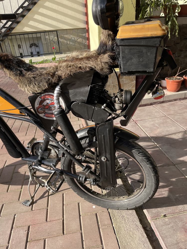 Bicicleta cu motor in 2T