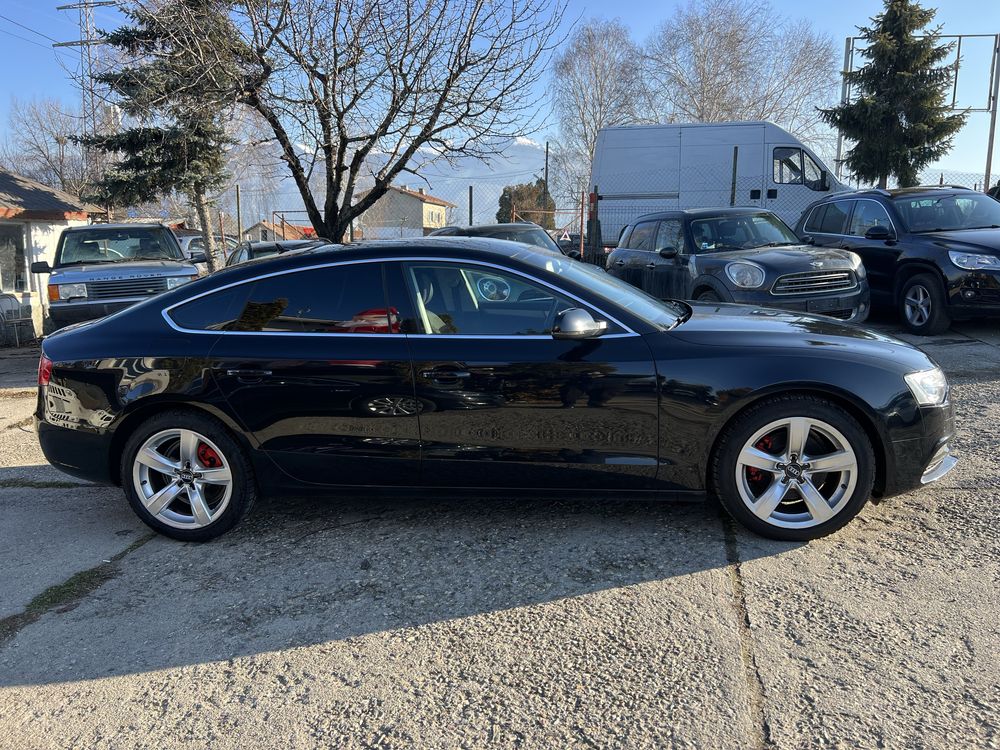 Audi A5 2.0TDI spotrback Quattro .