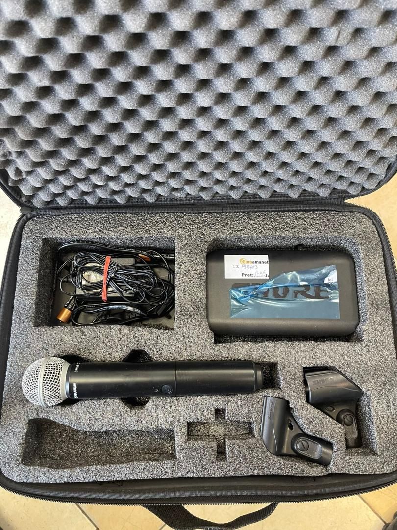 Sistem wireless Shure BLX4/ M17 cu microfon de mana SM58 -A-