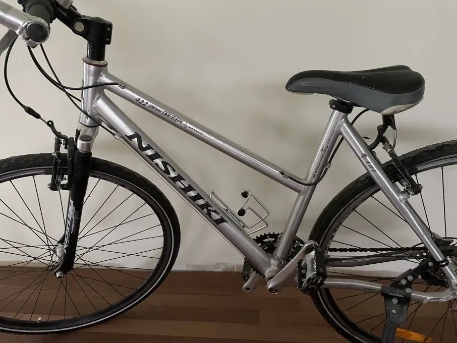 Bicicleta trekking barbati Shimano XT si bicicleta dama Nishiki Hybrid