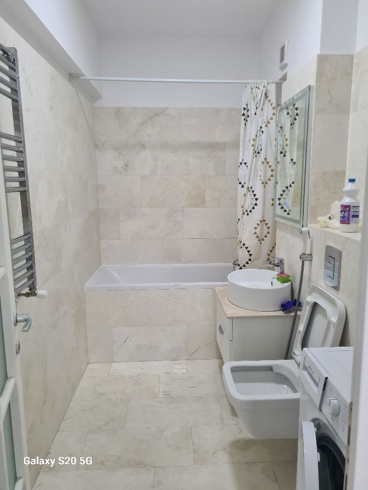inchiriez apartament doua cam.