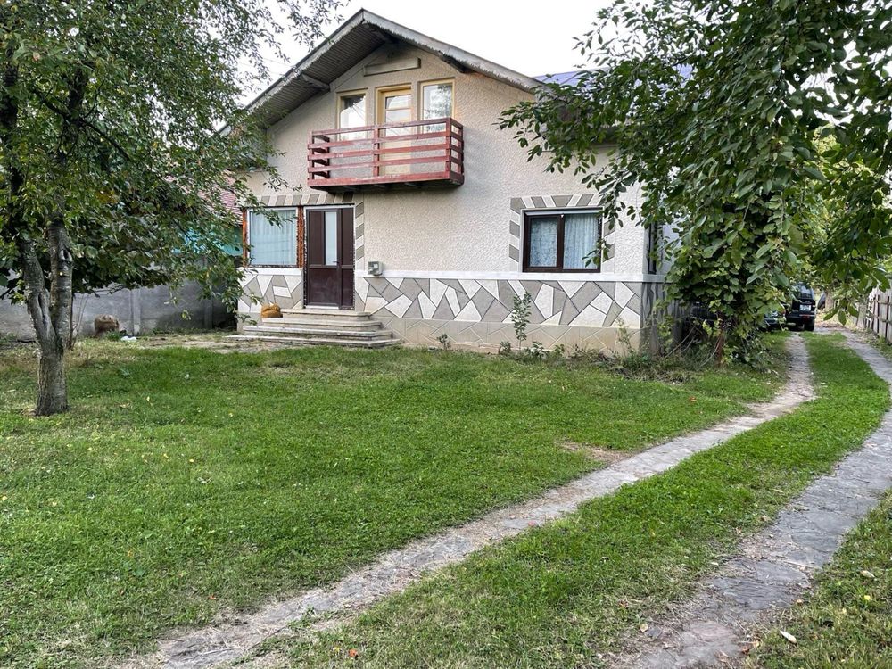 Casa cu gradina in zona de dealuri