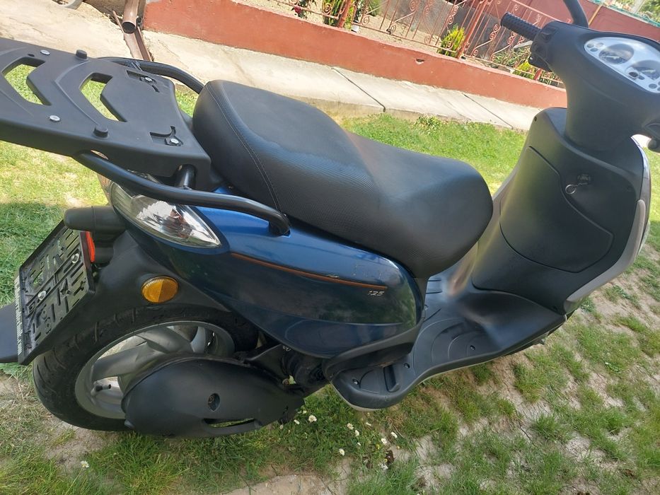 Piaggio  125 ..și un kymco 125