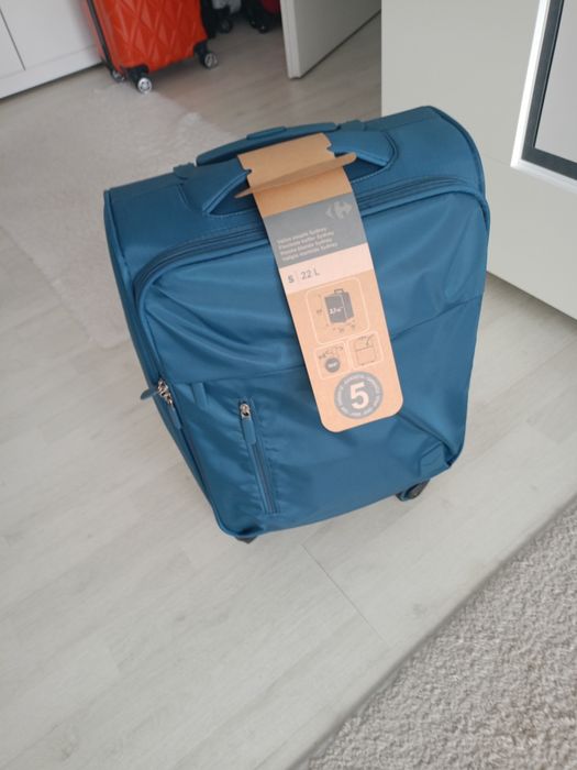 Vând troler material textil dimensiune de 54 cm nou nouț, produs de ca