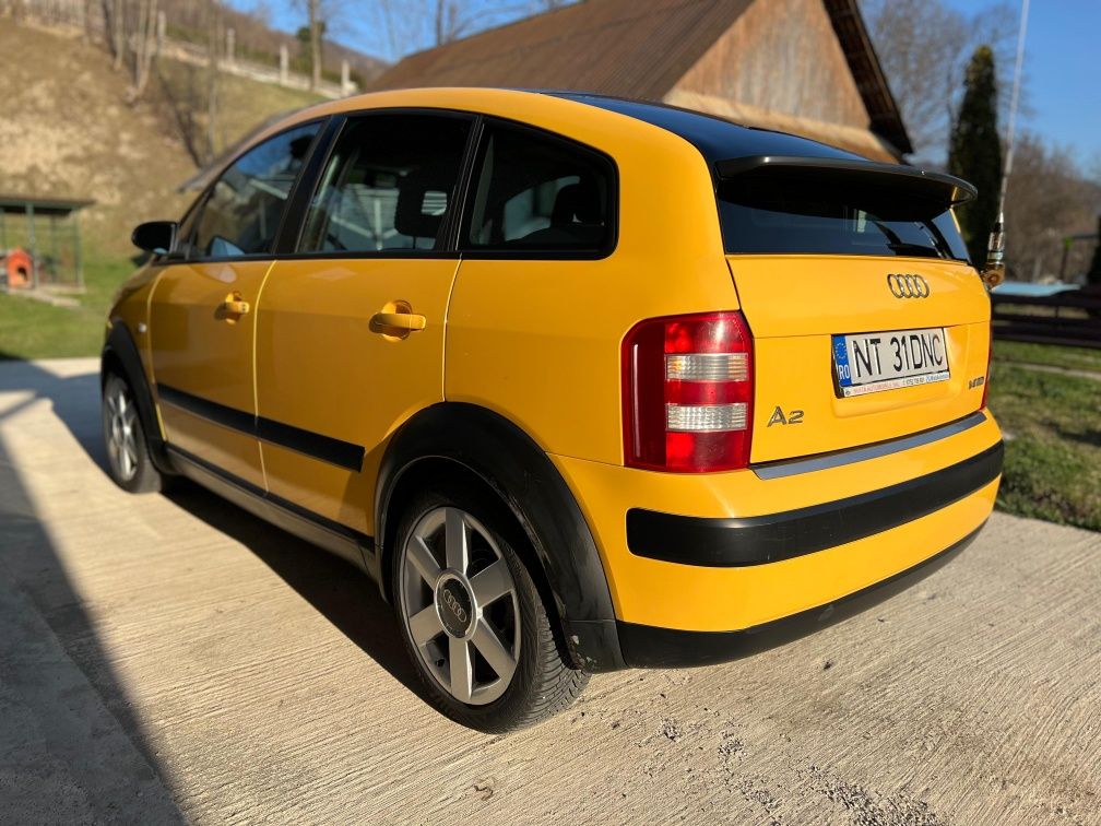 Audi A2 1.6 FSI | 2004 | Benzină | Culoare Galbenă

---

Audi A2