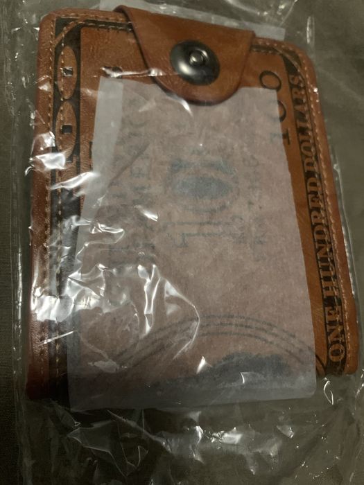 Протмоне 100 долара чисто ново