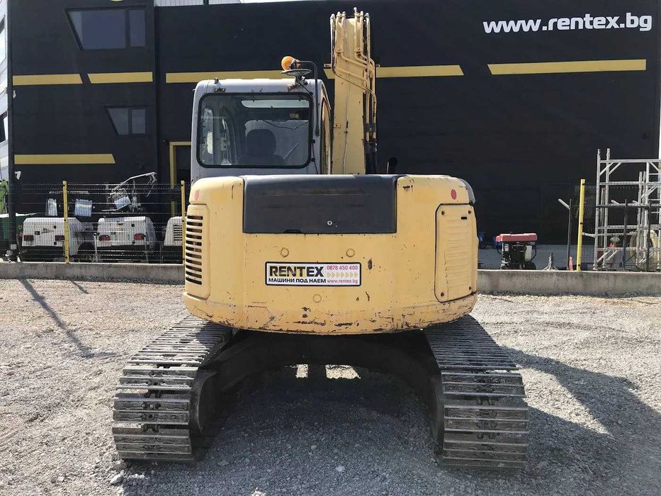 Багер New Holland Kobelco E70SR-1ES 8000кг