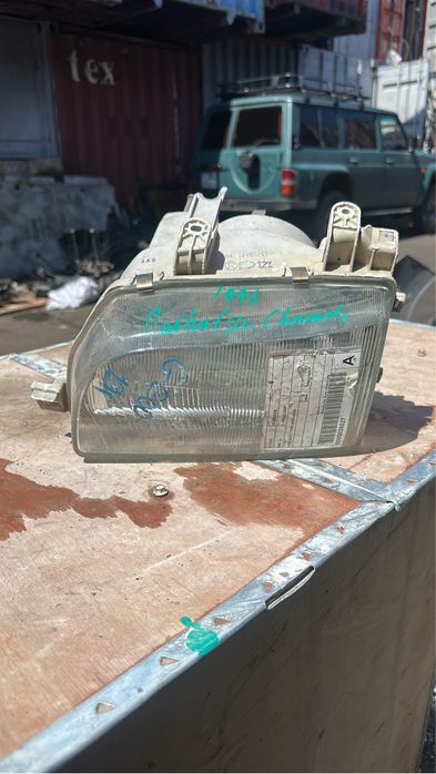 Левая фара Daihatsu Charade 1996