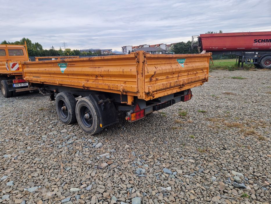 Remorca tandem basculabila