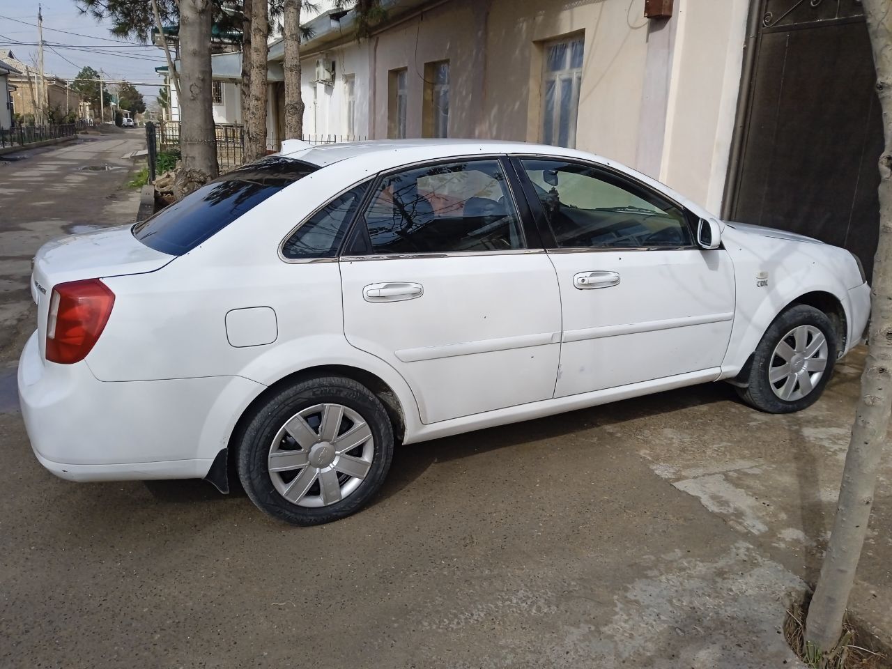 Lacetti 1.8 yili 2011 metan80