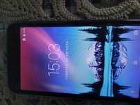 Сенсорный телефон LG