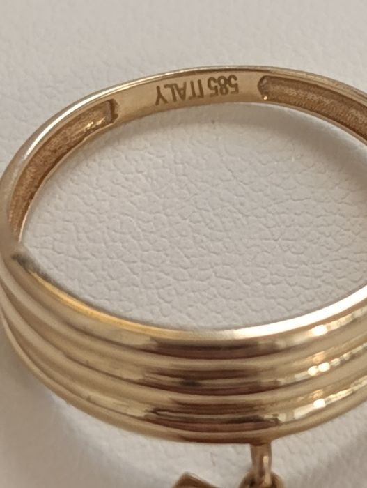 золотая кольцо, Италия бренд TIFFANY . Проба 585 гр, вес 2,10. Р 18.