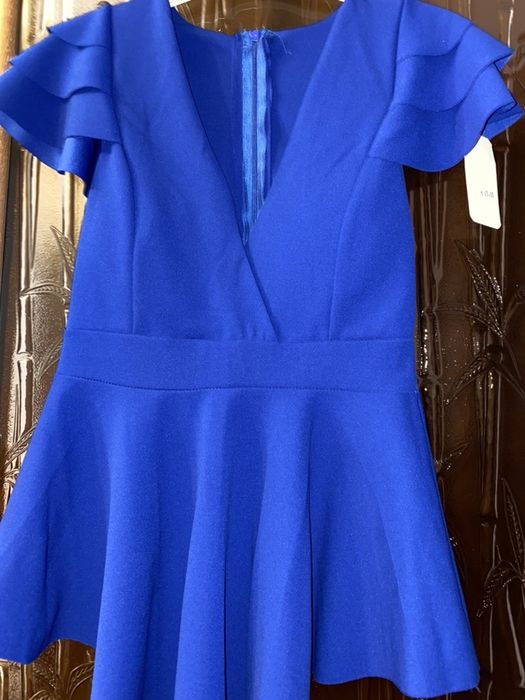 Vând bluza cu fermoar la spate