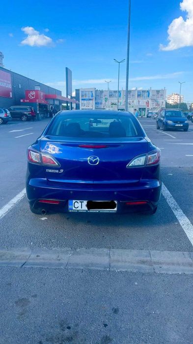 Mazda 3 Berlina 1.6 benzină 105 CP