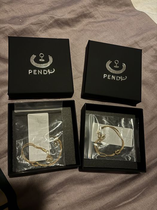 Гривни за двойки pendi