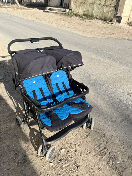 Двойная коляска черная