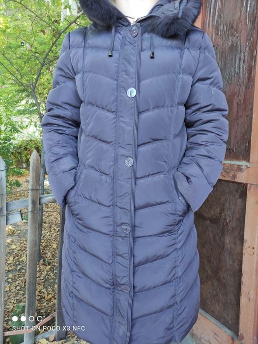 Пуховик женский,в отличном состоянии