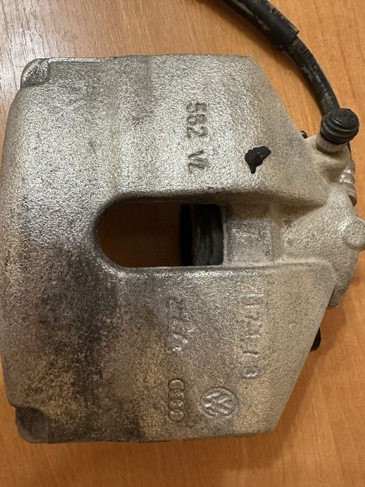 Суппорт правый Шкода рапид Фольксваген поло