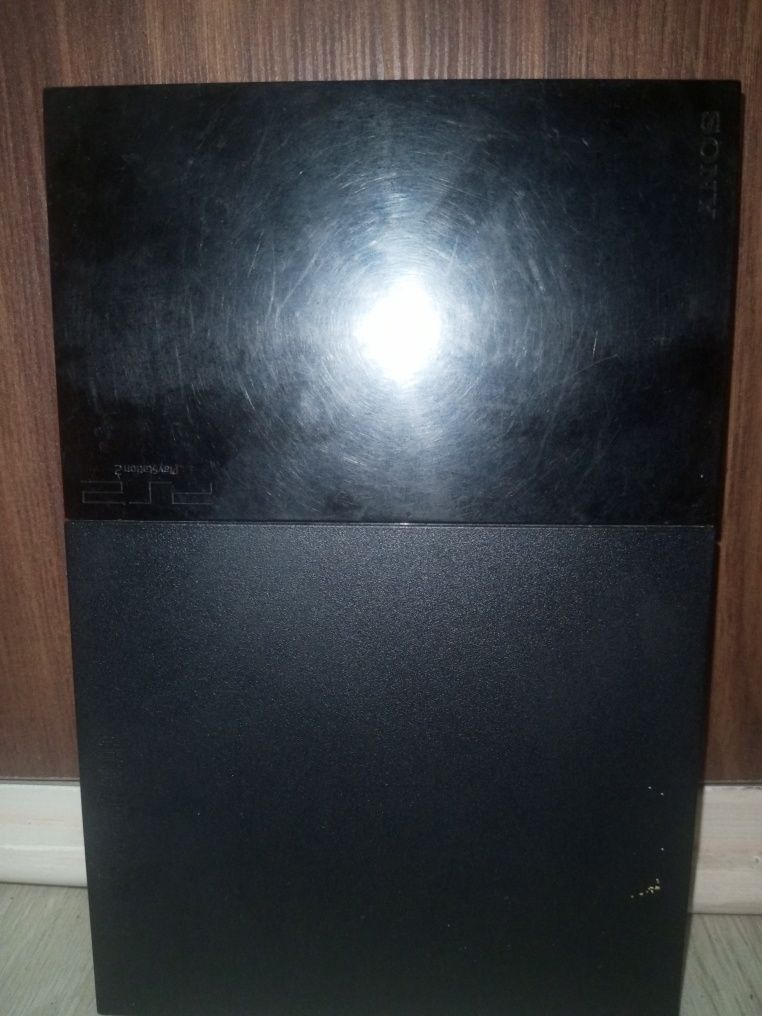 PS2 holati yaxshi qotmidi programma yaxshi josstiklari bor 2ta