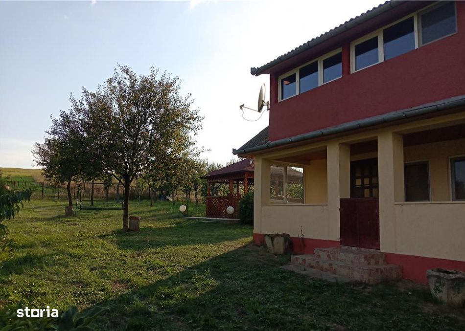 Teren 11.600 mp intravilan, cu casa si utilitati pe proprietate – Ca