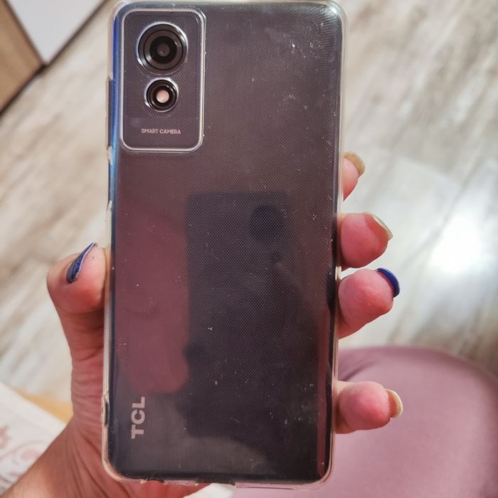 TCL Телефон неразличим от нов
