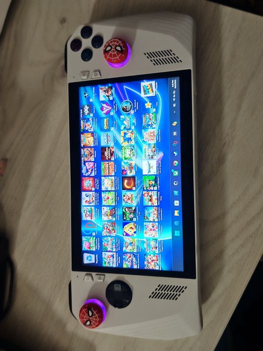 Vând consola Asus Rog Ally Z1 Extreme / schimb cu nintendo switch 2