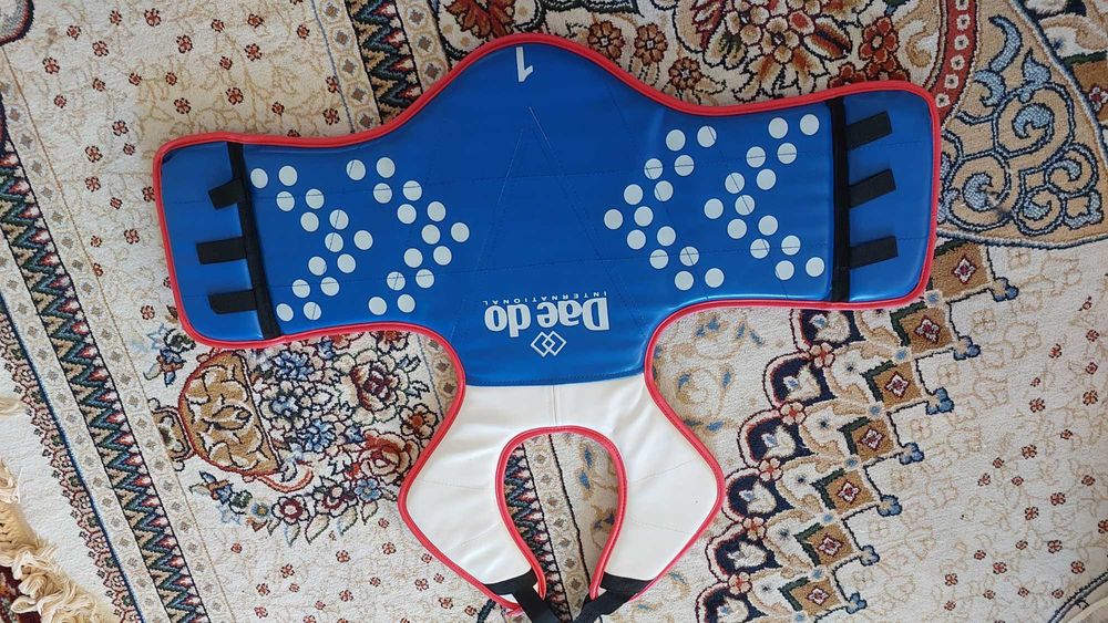 Защита для живота по тхеквондо