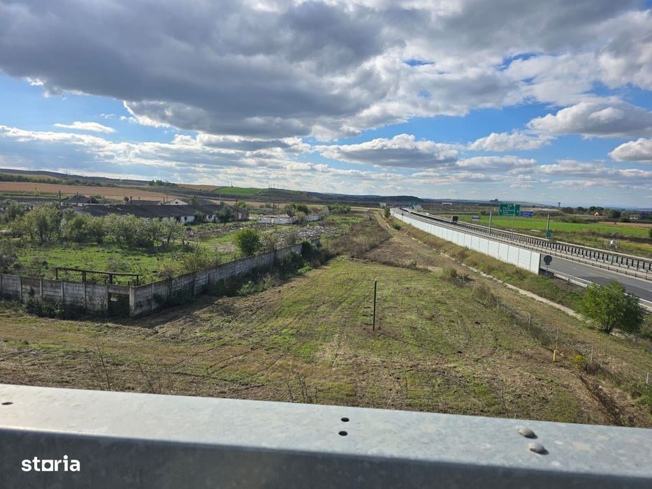 Teren+clădiri 60.000 mp.18 euro mp.deschidere la autostradă,