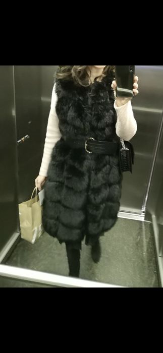 Vesta blana artificiala