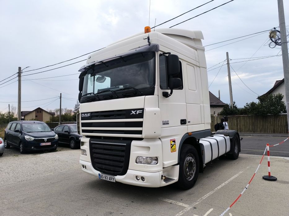 Ansamblu DAF XF 105 cutie automata an fabricație 2012 semiremorca Schm