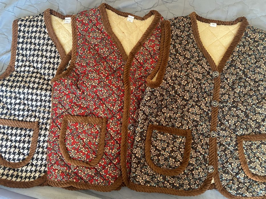 Продам теплые жилетки