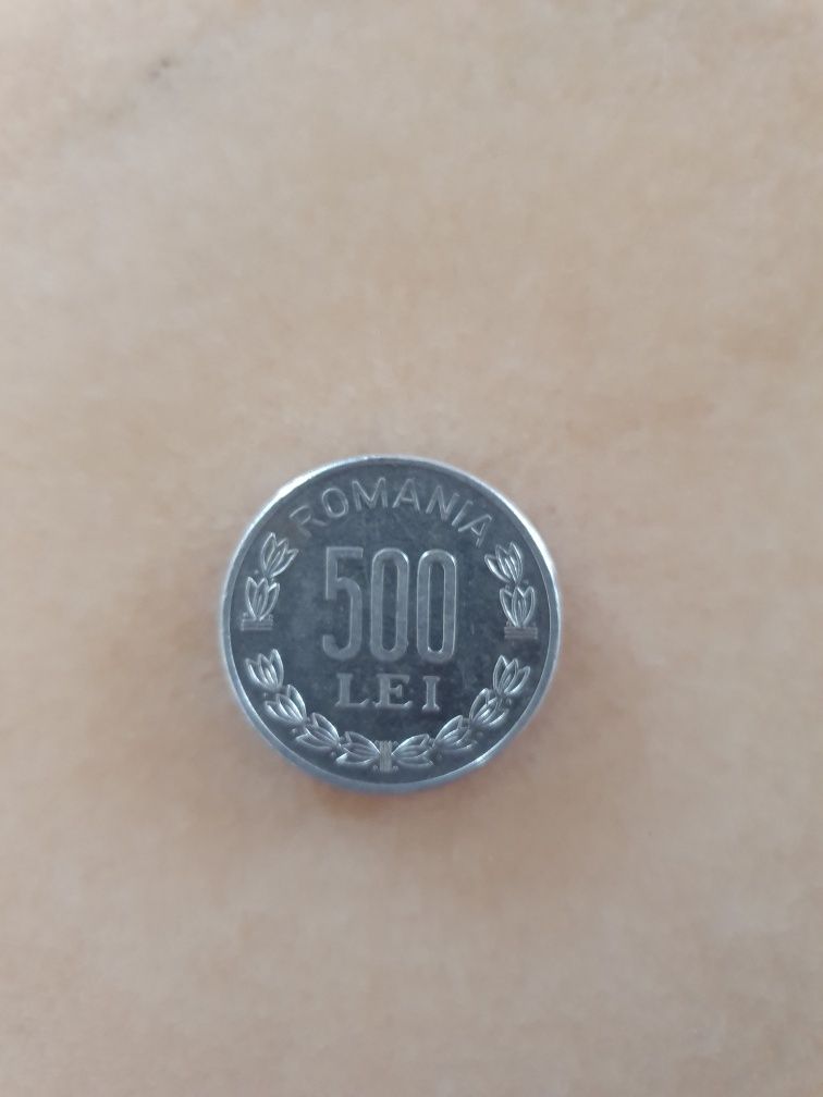 2 monezi de colecție (500 lei) și (1000)