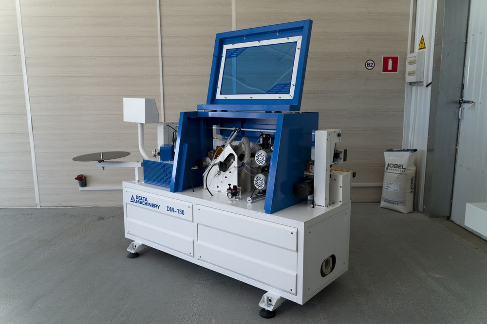 Кромкооблицовочный станок автомат DM-130