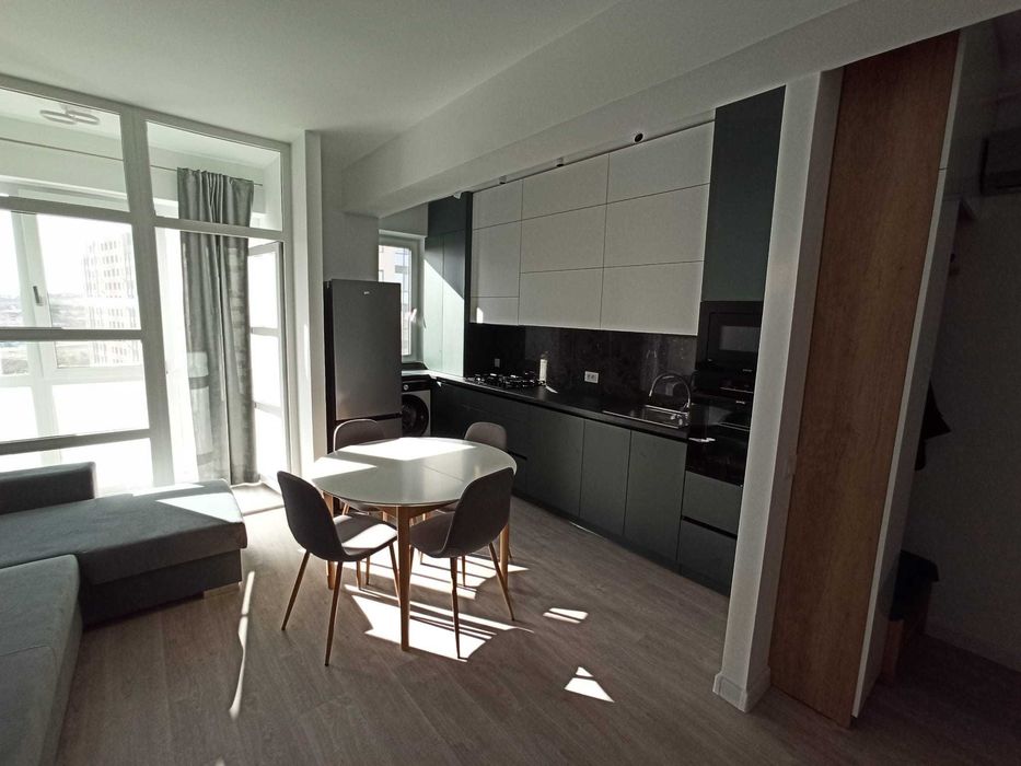 Chirie apartament 2 camere openspace+ loc parcare (Cartierul Visoianu)