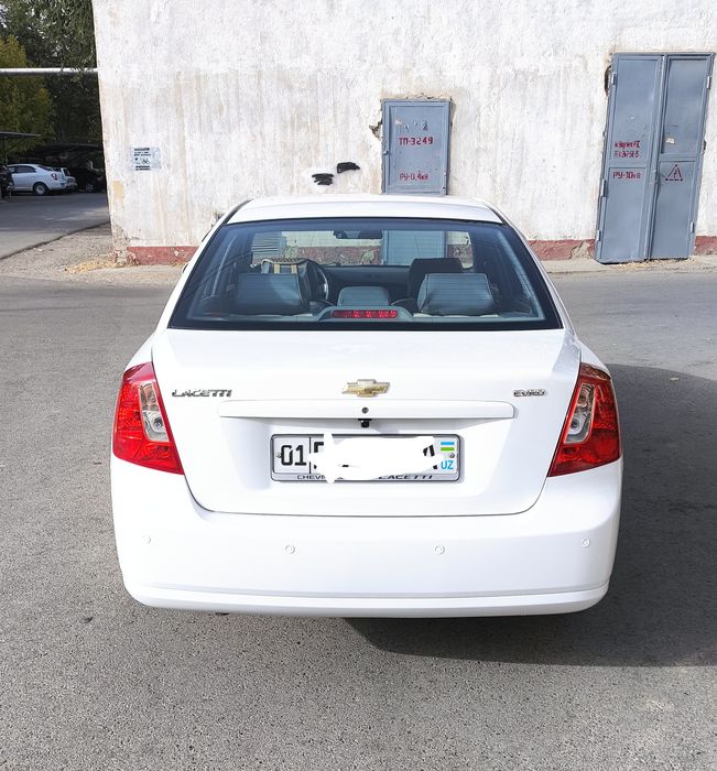 Ласетти 1.8 белый, мкп, 76800км, 2012 г.