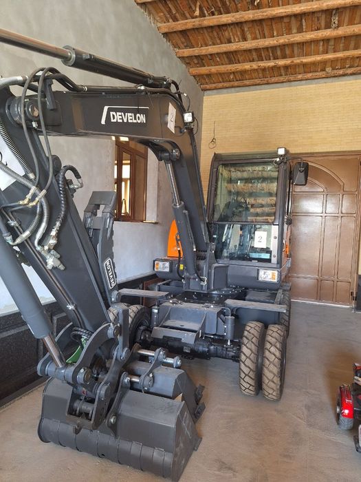 Мини экскаватор Девелон