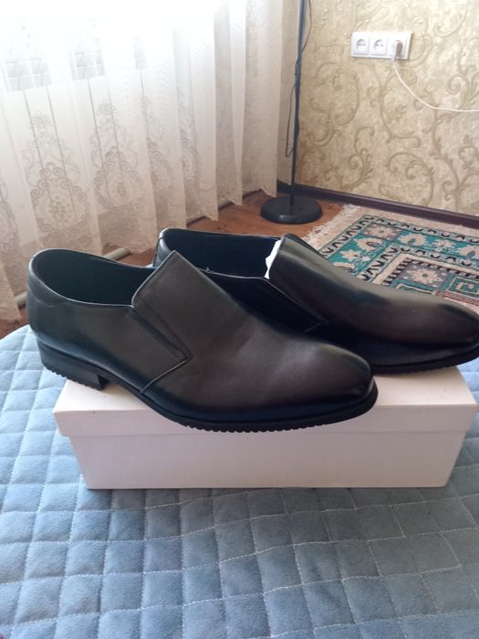 Продам новые мужские туфли