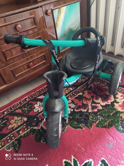 Самокат трёхколёсный