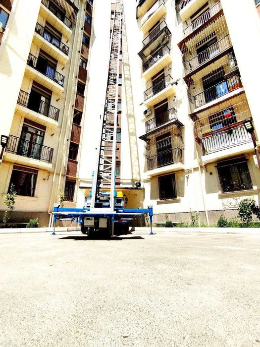 AVTOLIFT 32 metr yuklarni yuqori qavatlarga chiqarish (MOBILNIY LIFT)