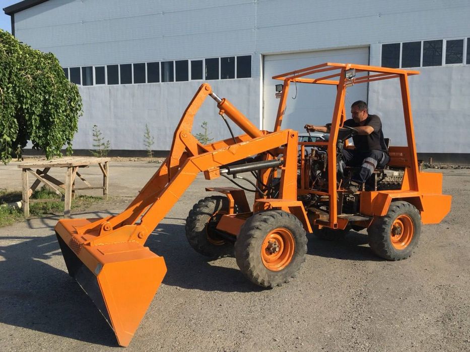 Услуги фронтального минипогрузчика с ковшом