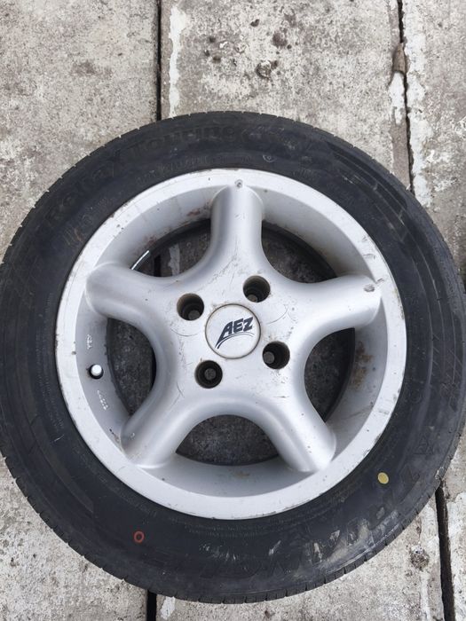 Vând 4 anvelope 175/65R14 4x100 + cauciucuri de vara negociabil