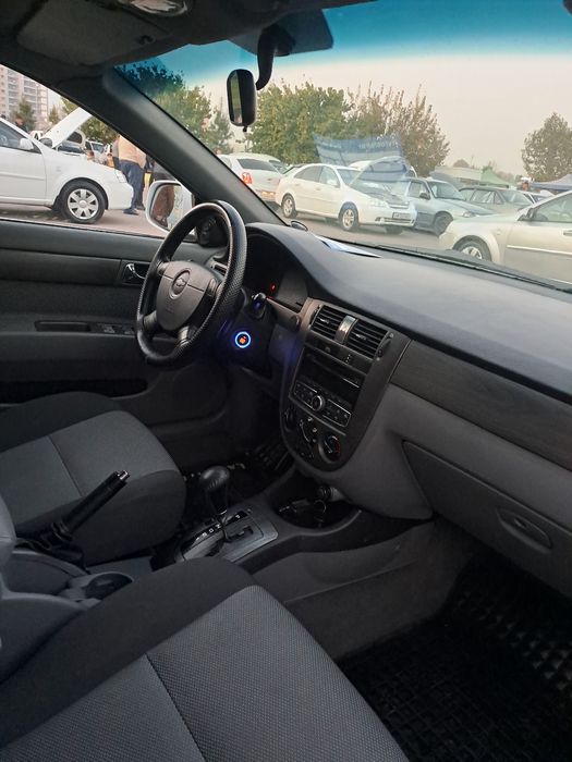 Ласетти 2011 автомат жентра килинган