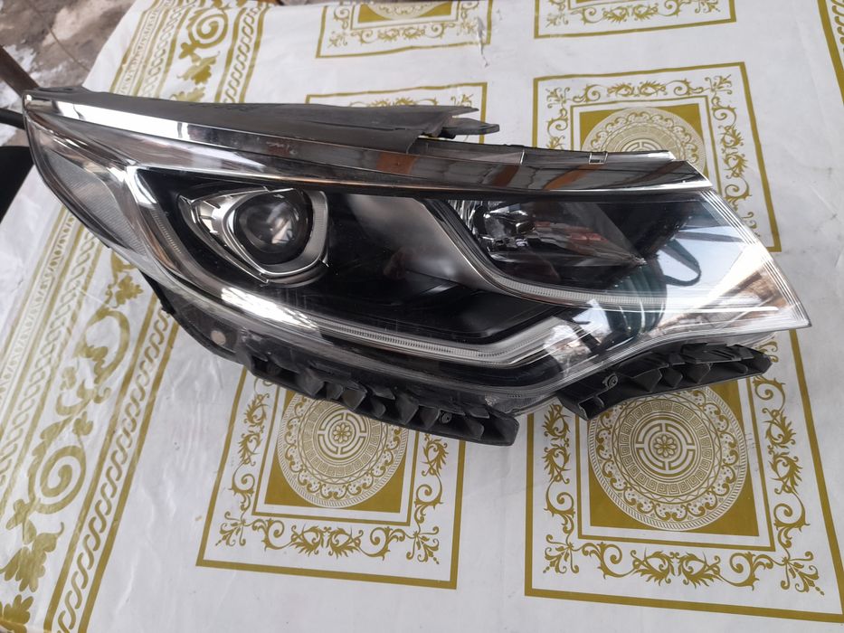 Киа К5 крыло передннее левое . Фара правая.рулевая колонка. магнитола.