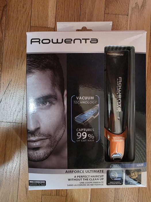 Masina de tuns cu vacuum Rowenta