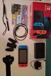 Vand sau schimb Nintendo switch + 2 jocuri