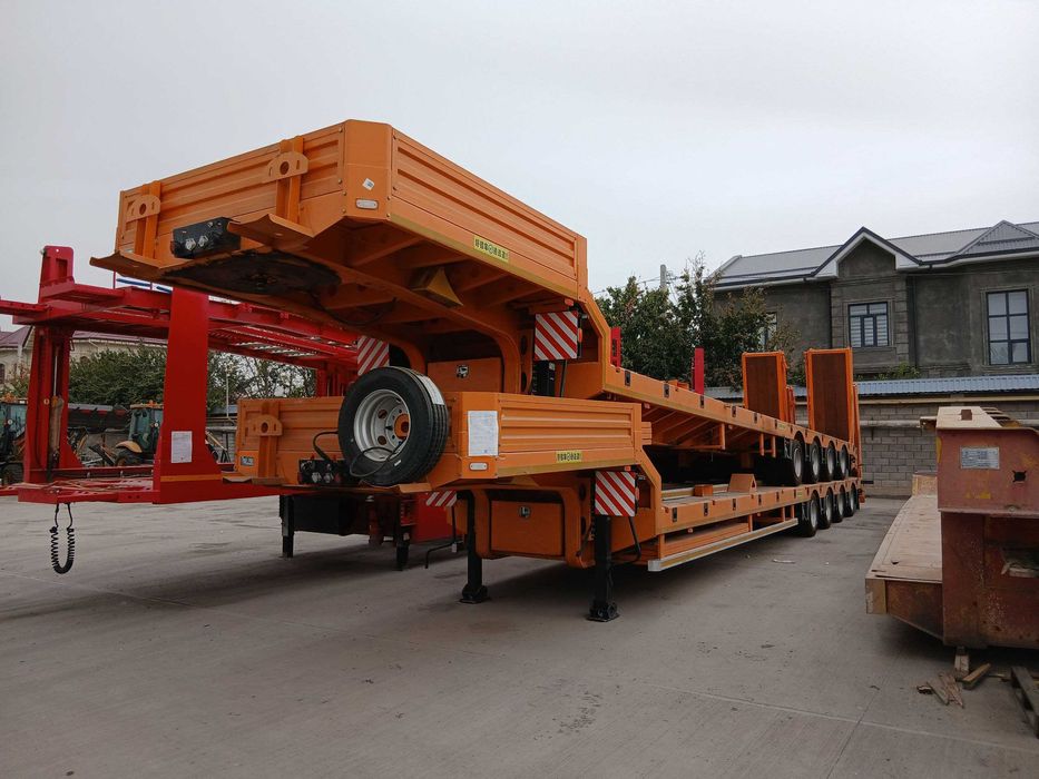 Низкопольный полуприцеп тяжеловоз (трал) грузоподъемностью 53 т